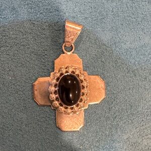 Elegant Sterling silver and onyx Cross.
